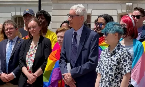 Governor Tony Evers Raises Progress Pride Flag at Wisconsin State Capitol, Emphasizing Diversity and Inclusion